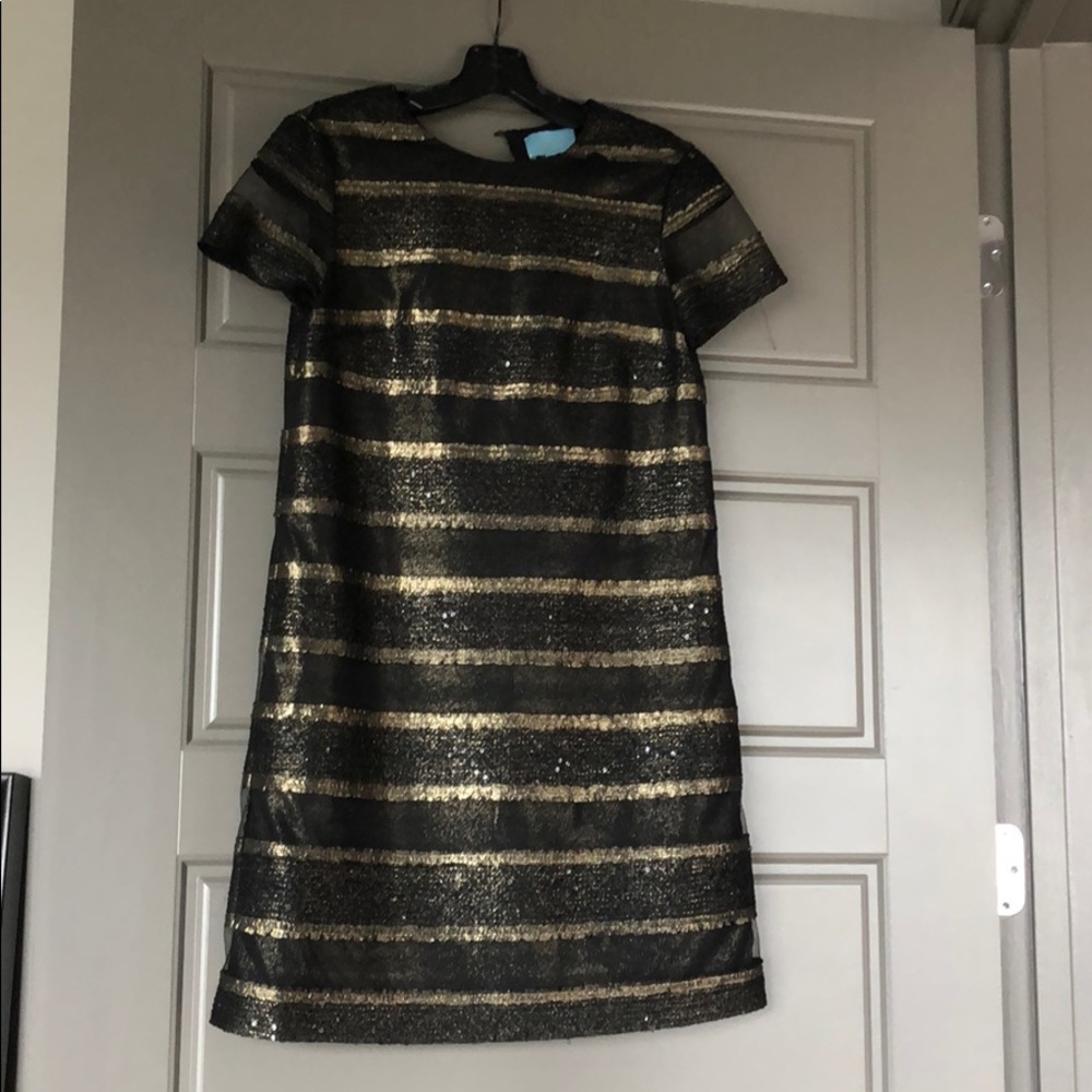 Very unique black and gold sparkly dress